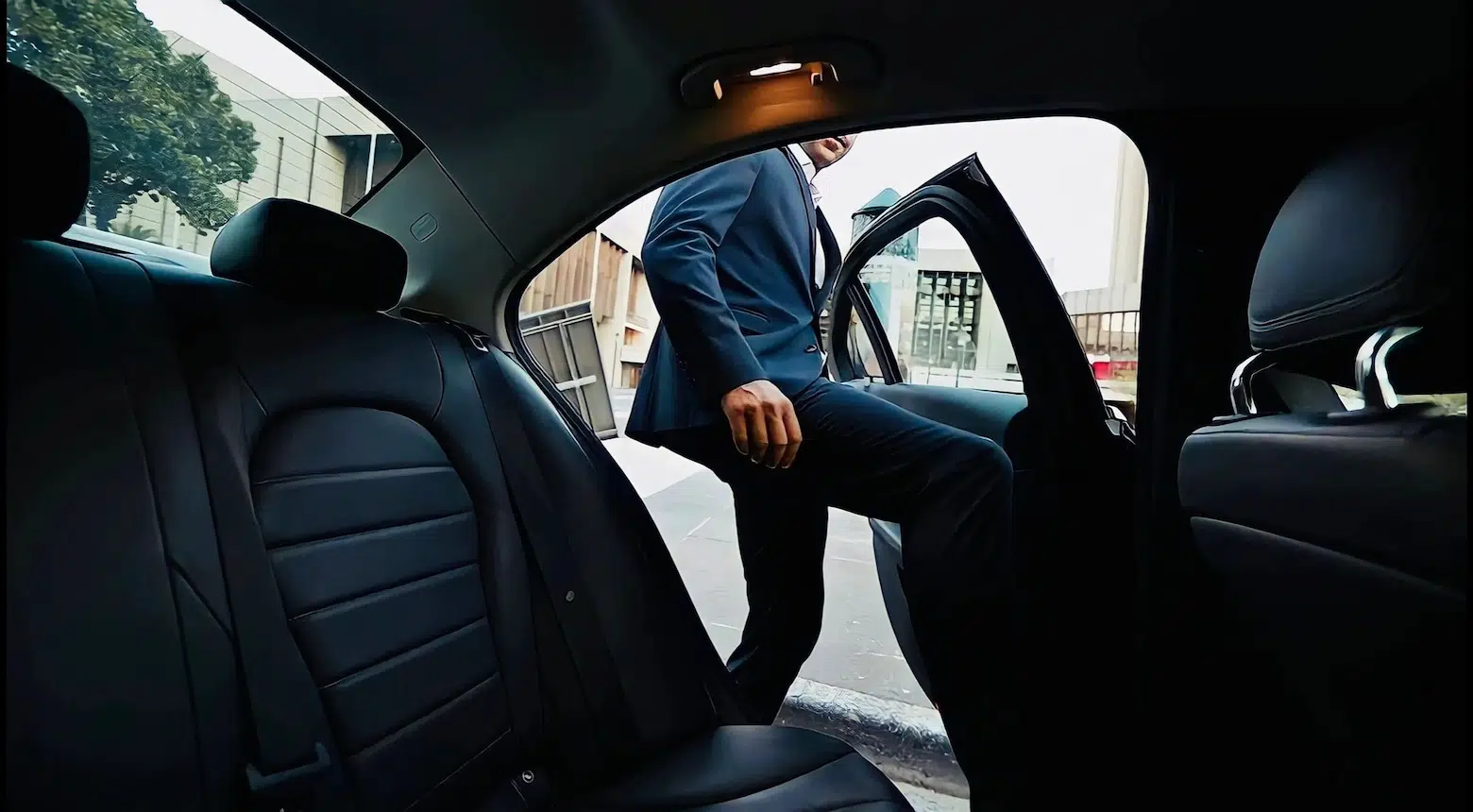 Chauffeur opening the car door for an executive client in Arlington Heights, IL